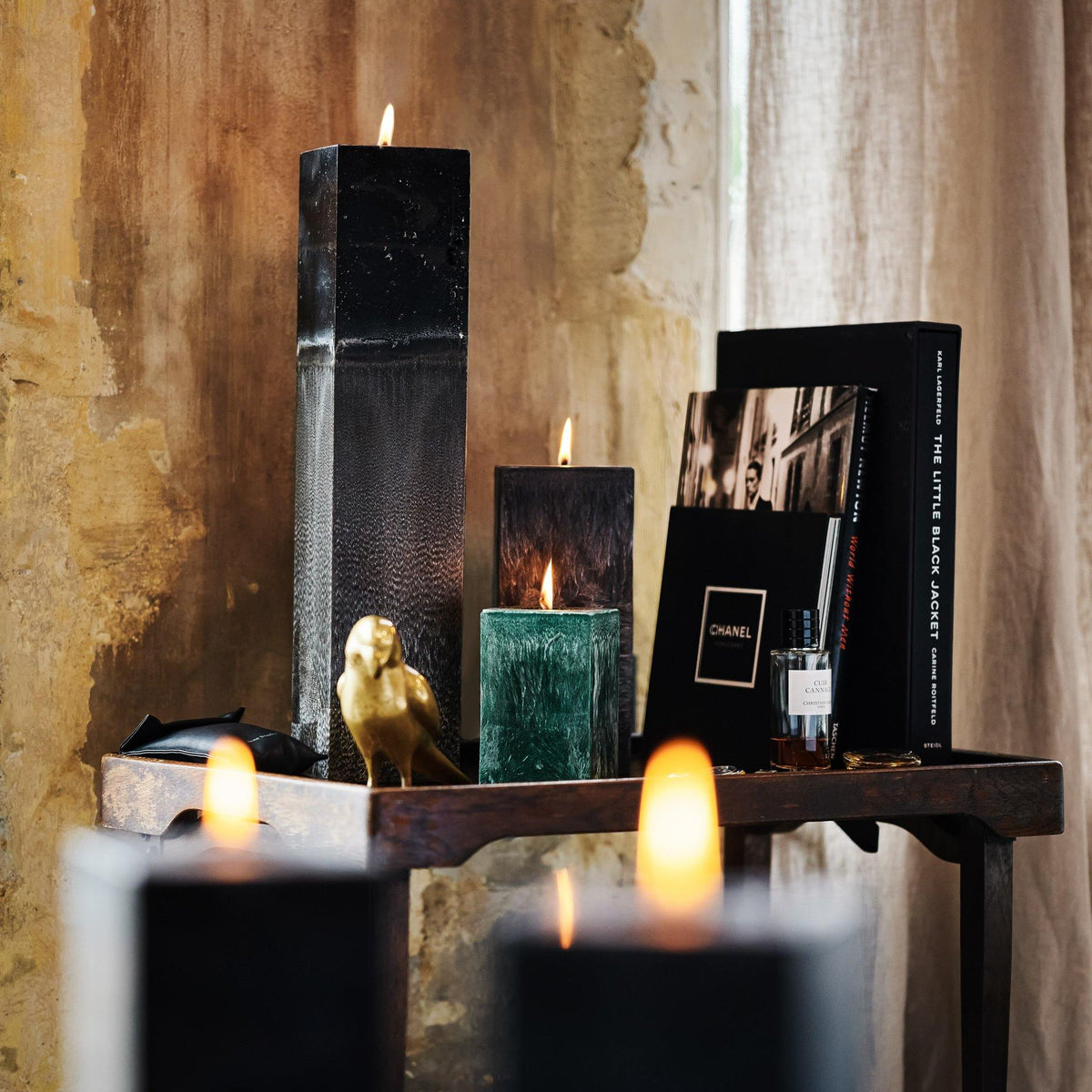 large and small square green and black pillar candles