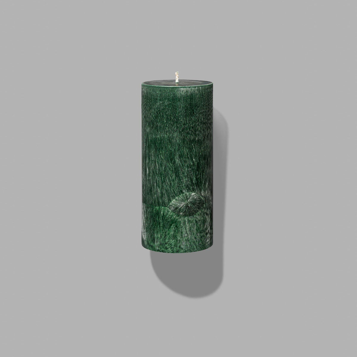 green pillar candle