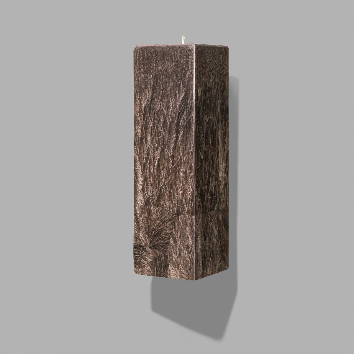 brown square pillar candle